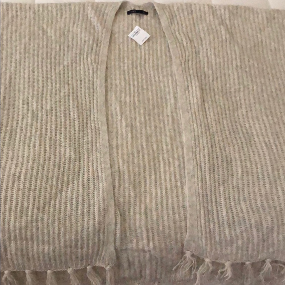 Cream poncho sweater